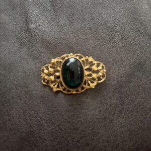 Vintage Gold-Tone Filigree Brooch With Green Glass Cabochon Oval Centerpiece